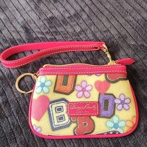 Dooney & Burke wristlet w flowers hearts and raspberry trim!